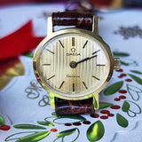 【OH済み】OMEGA オメガ Geneve ジュネーヴ ストライプ文字盤 手巻き腕時計