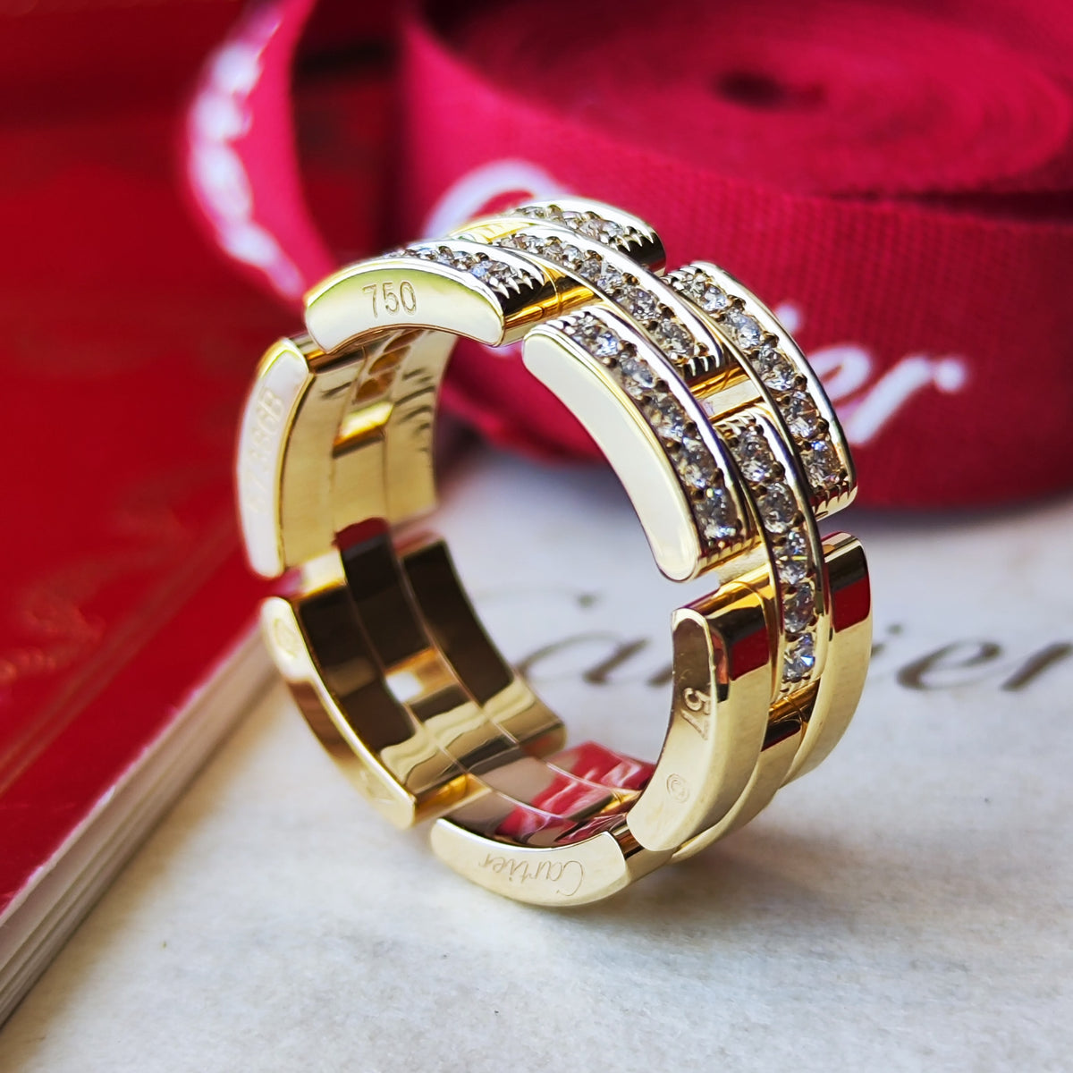Cartier カルティエ マイヨンパンテール
3連 ハーフダイヤ 18金YG 57