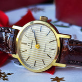 【OH済み】OMEGA オメガ Geneve ジュネーヴ ストライプ文字盤 手巻き腕時計