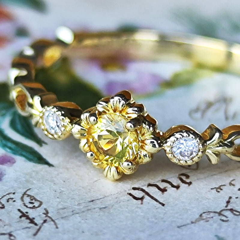 【神様の宿る石】天然イエローサファイア プクラジ ハーフエタニティリング