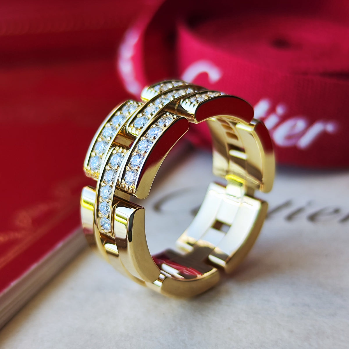 Cartier カルティエ マイヨンパンテール
3連 ハーフダイヤ 18金YG 57
