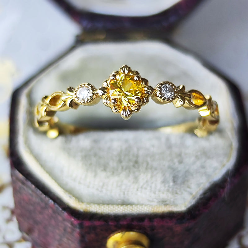 【神様の宿る石】天然イエローサファイア プクラジ ハーフエタニティリング