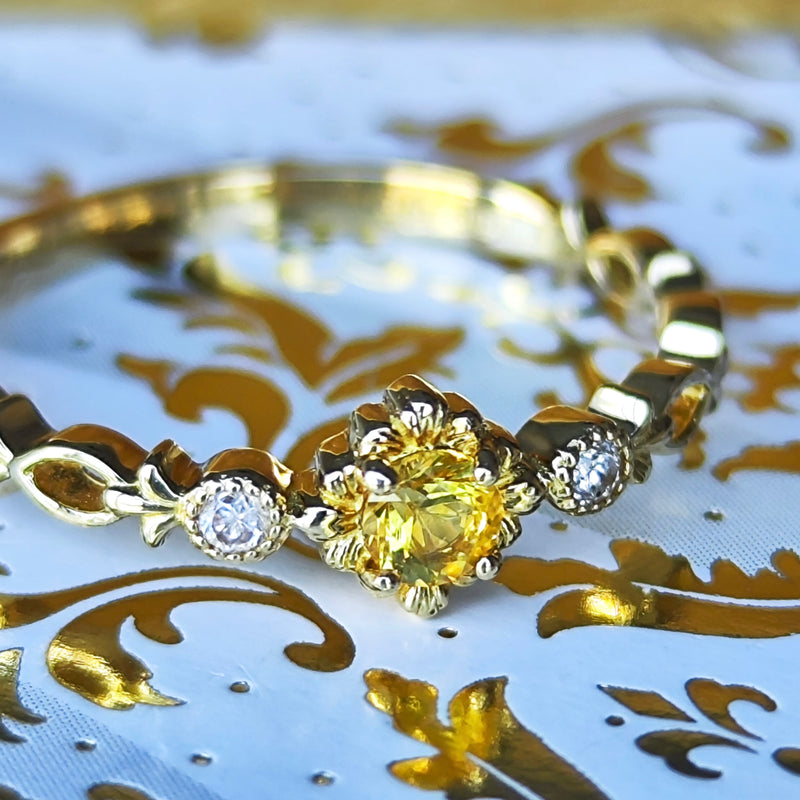 【神様の宿る石】天然イエローサファイア プクラジ ハーフエタニティリング