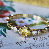 【神様の宿る石】天然イエローサファイア プクラジ ハーフエタニティリング